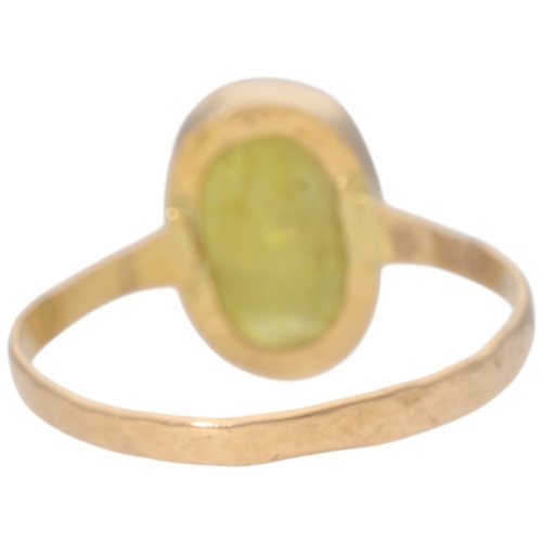 74 - Yellow Metal Tested 22ct Yellow Stone Ring Weight 3.85 Grams Finger Size Z +1  Set with a oval yello... 
