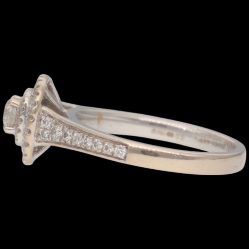 81 - 18ct White Gold Diamond Double Halo With Set Shoulders Weight 3.7 Grams Finger Size K  Set with a pr... 