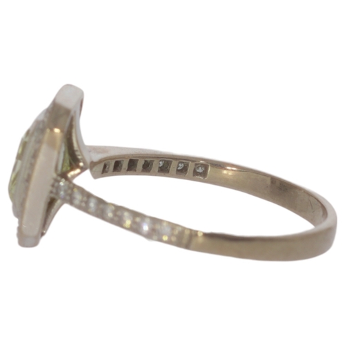 84 - 18ct Gold Ring With Yellow Diamond 5.5 Grams Size R Set with a principle radiant cut diamond of 1.64... 