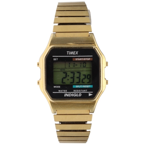 11 - Timex Indiglo Gold Tone Digital Watch – Model 555 CR2016

Gold-tone stainless steel case and bracele... 