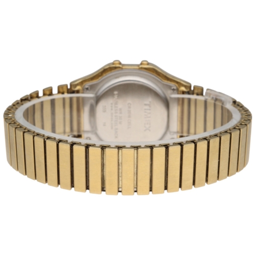 11 - Timex Indiglo Gold Tone Digital Watch – Model 555 CR2016

Gold-tone stainless steel case and bracele... 