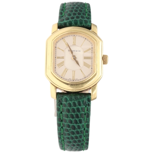 13 - Tiffany & Co. Mark Coupe 18k Gold Wristwatch

Movement/Materials: Swiss Quartz; 23mm 18k Yellow Gold... 