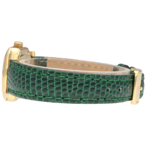 13 - Tiffany & Co. Mark Coupe 18k Gold Wristwatch

Movement/Materials: Swiss Quartz; 23mm 18k Yellow Gold... 