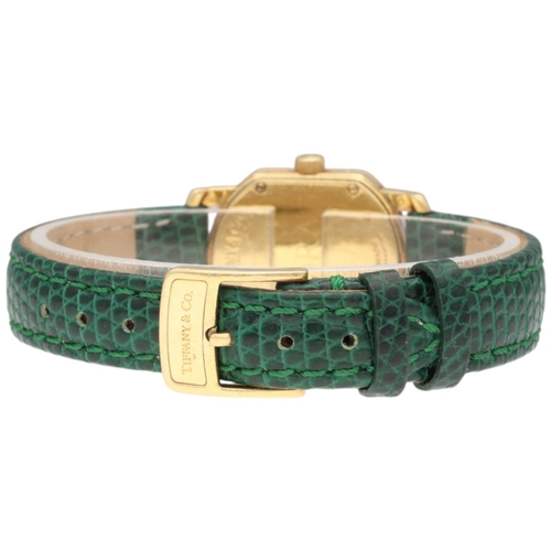 13 - Tiffany & Co. Mark Coupe 18k Gold Wristwatch

Movement/Materials: Swiss Quartz; 23mm 18k Yellow Gold... 