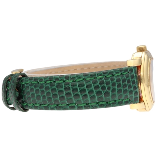 13 - Tiffany & Co. Mark Coupe 18k Gold Wristwatch

Movement/Materials: Swiss Quartz; 23mm 18k Yellow Gold... 