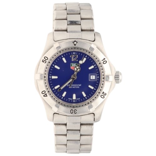 15 - Tag Heuer WK1313-1  
Stainless Steel  
Quartz  
Blue Dial  
28mm  
Date Indicator 
Box And Papers