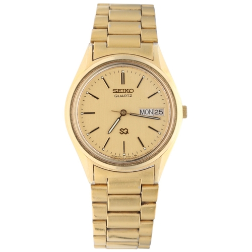 25 - Seiko SQ (Superior Quartz) 8C23-6000 Gold-Tone Dress Watch, c.1980s.

Movement/Materials: Seiko Cali... 