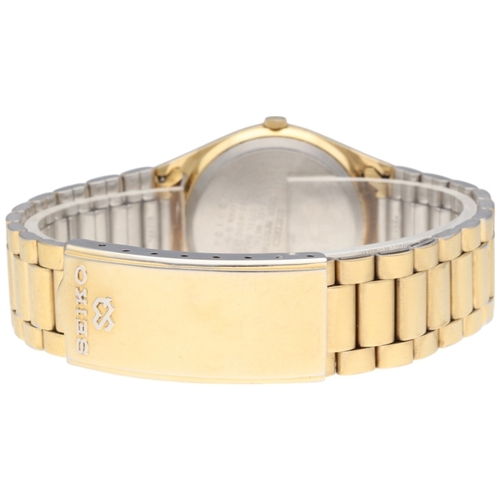 25 - Seiko SQ (Superior Quartz) 8C23-6000 Gold-Tone Dress Watch, c.1980s.

Movement/Materials: Seiko Cali... 