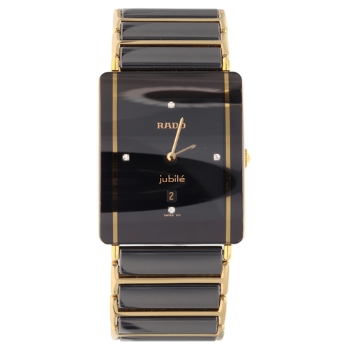 42 - Rado Integral Jubilé wristwatch, featuring a rectangular black high-tech ceramic and gold PVD-plated... 
