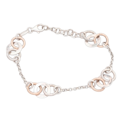 A modern and versatile Links of London 'Aurora' bracelet and necklace set,
featuring a delicate chain interspersed with polished open oval and circular links in a mix of sterling silver and rose gold vermeil.

Bracelet:
Weight: 5.3 grams
Length: 8"

Necklace:
Weight: 12.7 grams
Length: 25"

Material: Sterling Silver and Rose Gold Vermeil (Sterling silver plated with rose gold).