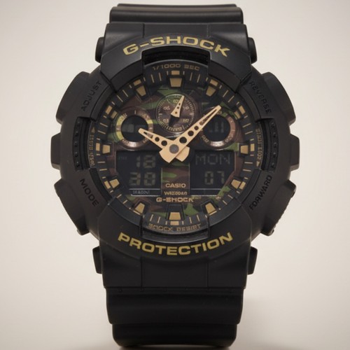 Casio G-Shock GA100CF – Men’s Large Size Resin Sports Watch

Model: GA100CF (also seen as GA-100CF-1A9ER) 
Movement: Quartz analog-digital (Module 5081) 
Case / Bezel Material: Resin 
Band / Strap: Resin strap, integrated with the case 
Dial: Camouflage pattern dial in black/khaki tones, large size case for high presence 
Case Size: Approx. 55 × 51.2 × 16.9 mm 
Water Resistance: 200 m / 20 BAR 
Other Features:
Shock resistant & magnetic resistant 
CASIO Australia
1/1000-second stopwatch, countdown timer, world time (29 time zones / 48 cities)