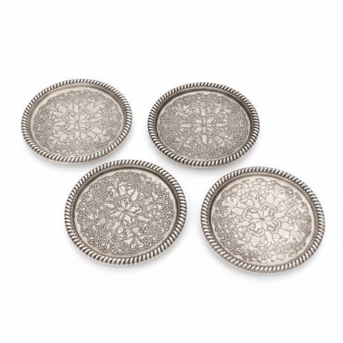 A set of four silver-plated coasters. Maker: Unidentified. Origin: To be confirmed. Material: Silver plate — no bullion value. Dimensions: 7.7cm x 7.7cm. Weight: 70.2g. Condition: Please refer to images or view in person.