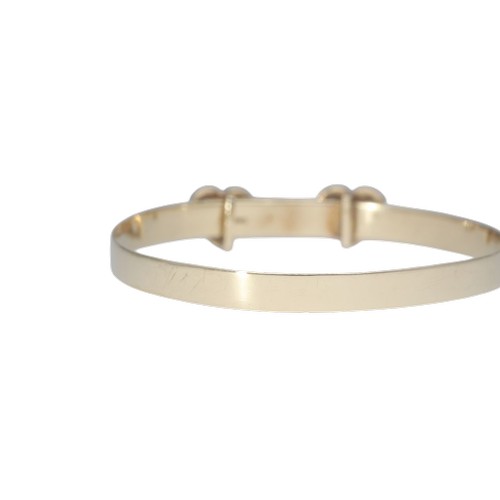 1 - A yellow metal tested as 9ct cz's heart bangle baby bangle. Weighing 3.47g.