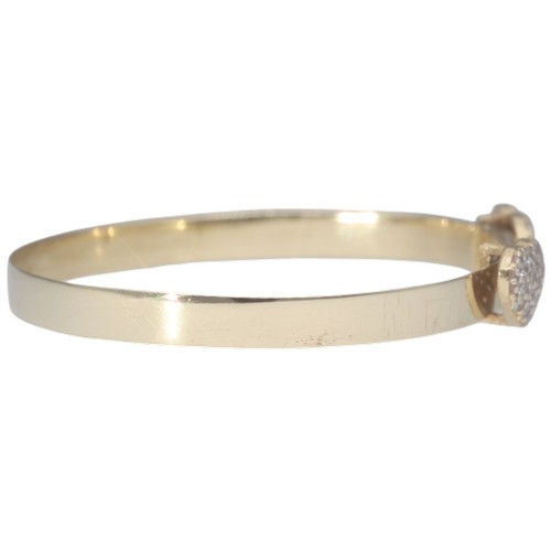 2 - A yellow metal tested as 9ct CZ's heart bangle baby bangle. Weighing 3.66g.