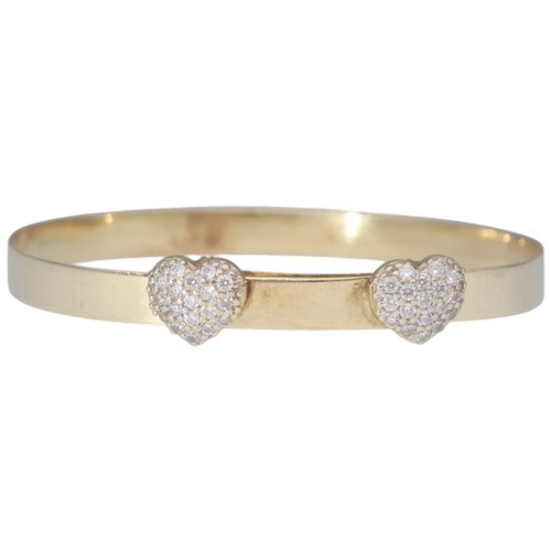 2 - A yellow metal tested as 9ct CZ's heart bangle baby bangle. Weighing 3.66g.