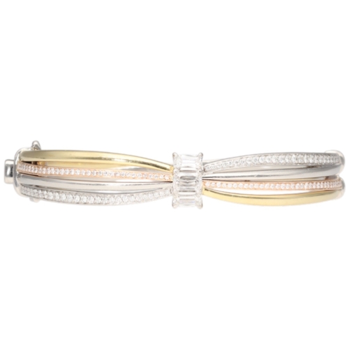 13 - Boodles 18k Multi-Tone Gold 'Ribbons' 1.81ctw Ashoka & White Diamond Bangle, weight 47.8 g. 

An exq... 