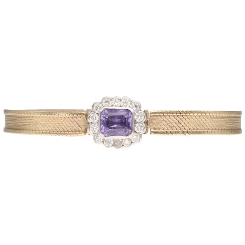14 - A VINTAGE PURPLE SAPPHIRE AND DIAMOND CLUSTER STRAP BRACELET. Designed in the mid-century watch styl... 