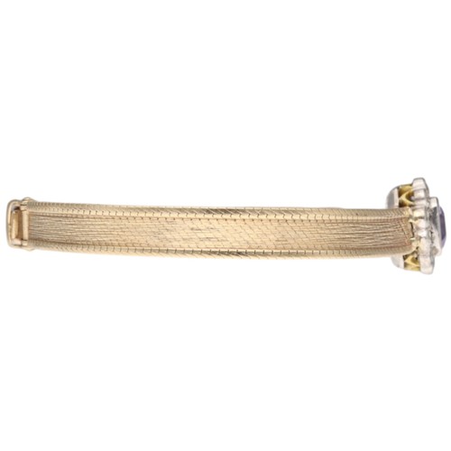 14 - A VINTAGE PURPLE SAPPHIRE AND DIAMOND CLUSTER STRAP BRACELET. Designed in the mid-century watch styl... 