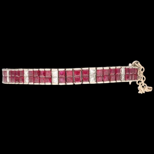 20 - 18ct white gold ruby and diamond bracelet. Set with princess-cut rubies and diamonds, approx. 1.60ct... 