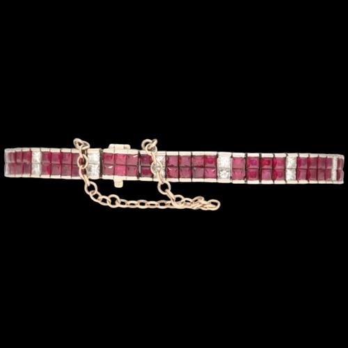 20 - 18ct white gold ruby and diamond bracelet. Set with princess-cut rubies and diamonds, approx. 1.60ct... 