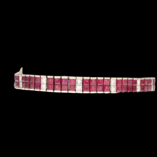 20 - 18ct white gold ruby and diamond bracelet. Set with princess-cut rubies and diamonds, approx. 1.60ct... 