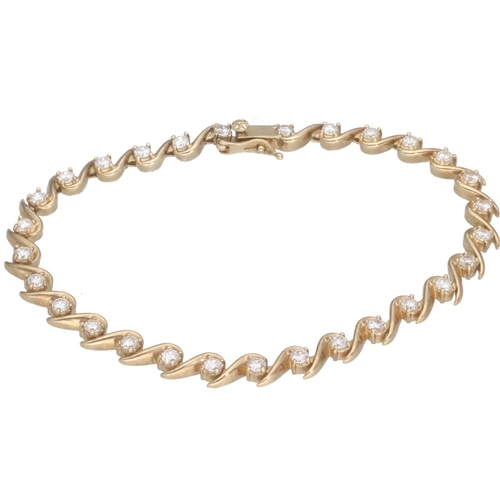 22 - A 9ct yellow gold CZ tennis bracelet. Weighing 9.4g. Wrist size: 7 inches.