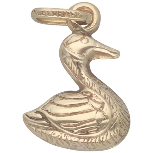 32 - A yellow metal tested 9ct swan charm. Weighing 0.74g.