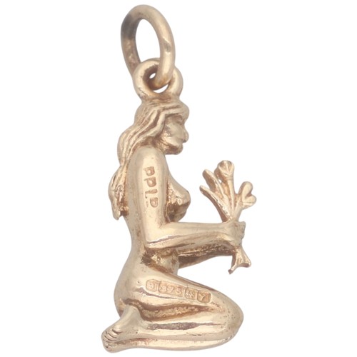 39 - A 9ct yellow gold Virgo charm. Weighing 2.4g.