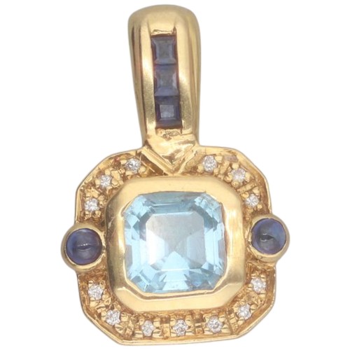 44 - A yellow metal tested 18ct blue and white stones pendant. Weighing 2.6g.
