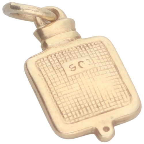 55 - A yellow metal stamped and tested 9ct hot water bottle charm. Weighing 0.44g.