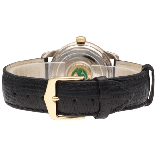 4 - Longines Conquest — a fine stainless steel vintage watch, Reference 9002, dated 1957. Featuring a si... 