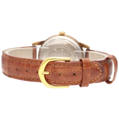 26 - Curtiss Super Automatic wristwatch, featuring a 34mm gold- plated case with a stainless steel screw-... 