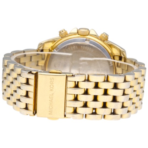 54 - Michael Kors MK5835

A ladies' Michael Kors wristwatch, reference MK5835, featuring a gold-tone stai... 