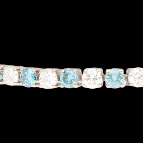 6 - White Metal Tested as 18ct Treated Blue Diamond And Diamond Tennis Bracelet. Set with treated blue b... 
