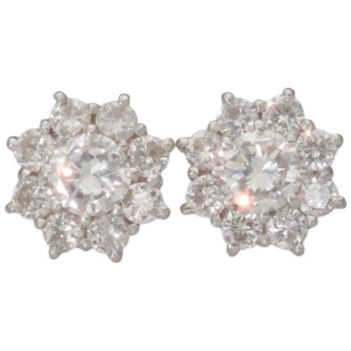 19 - 18ct White Gold Diamond Cluster Stud Earrings. Set with brilliant cut diamonds of 1.30ct total estim... 