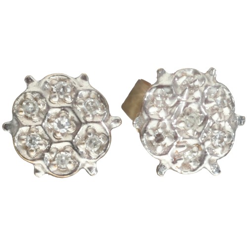 24 - 9ct gold diamond cluster earrings. Set with brilliant cut diamonds of 0.25ct total calculated weight... 