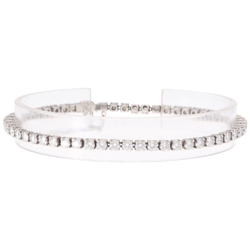 4 - A Platinum Diamond Line Bracelet. Set with brilliant-cut diamonds with a total estimated weight of 4... 