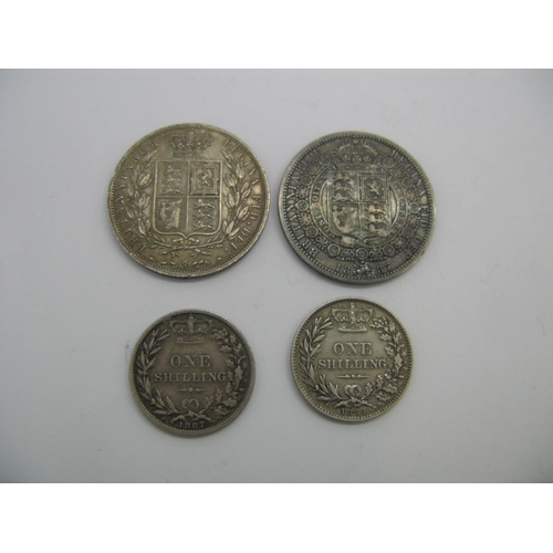 153 - Two Queen Victoria Halfcrowns 1887 (YH), 1887 (JH), one shilling 1887, one shilling 1884.