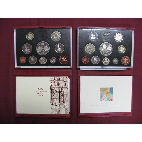 555 - Two Royal Mint United Kingdom Deluxe Proof Coin Sets, 1997, 1998, accompanied by literature, cased.