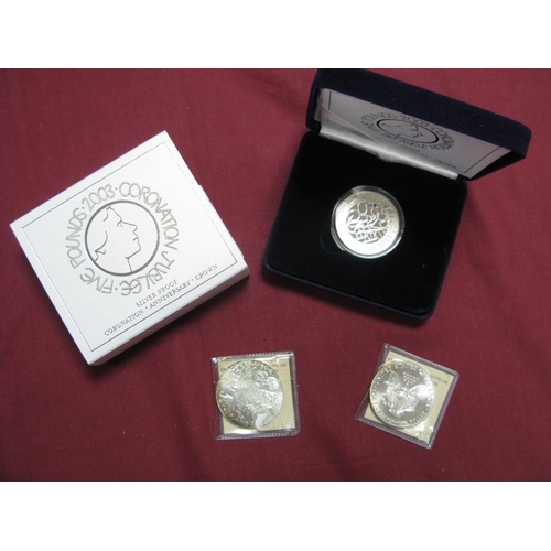 560 - Three Silver Coins, comprising of Royal Mint 2003 Coronation Jubilee Silver Proof Five Pounds, accom... 