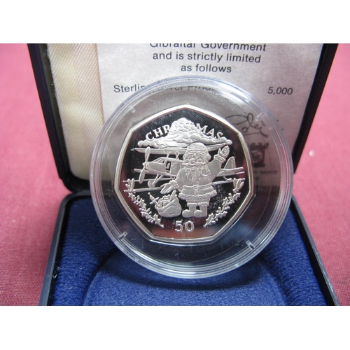 562 - A Pobjoy Mint Gibraltar Silver Proof Christmas Fifty Pence Coin 1996 'Santa With Bi Plane', accompan... 