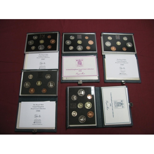 607 - Five Royal Mint United Kingdom Proof Coin Sets 1983, 1984, 1985, 1986, 1988, accompanied by literatu... 