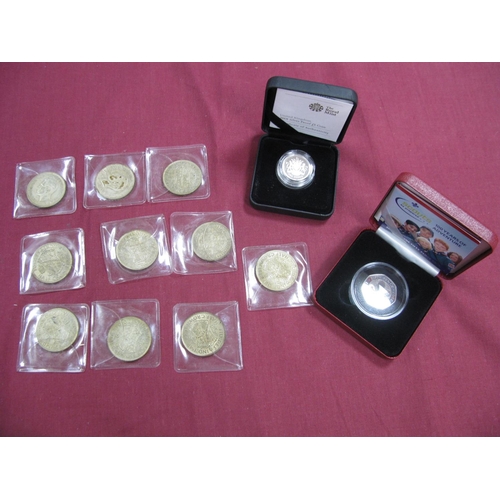 634 - The Royal Mint 2008 Silver Proof £1 Coin, 2007 Silver Proof Fifty Pence 'Scouts', both accompanied b... 