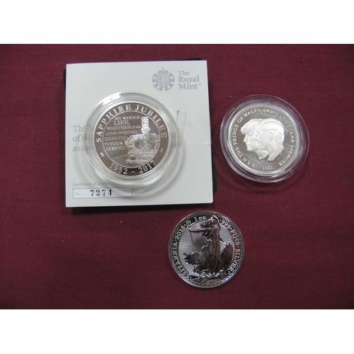 646 - United Kingdom Silver Britannia Two Pounds 2018, Silver Commemorative Crown 1981, 2017 Sapphire Jubi... 