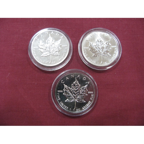 648 - Three Canadian Silver Maple Leaf 1oz, Five Dollar Coins, 1988, 1996, 1997.