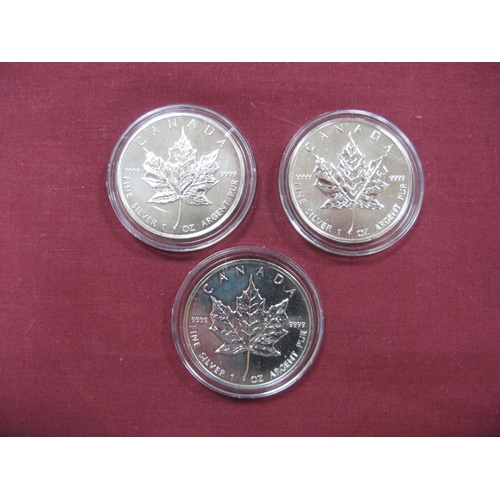 649 - Three Canadian Silver Maple Leaf 1oz, Five Dollar Coins, 1989, 1990, 1991.