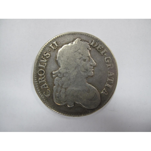 810 - Charles II Silver Crown 1679, obverse: Bust of Charles II, reverse: Four Cruciform Shields, accompan... 