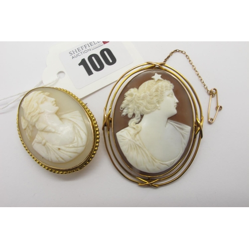 100 - An Oval Shell Carved Cameo Brooch, depicting female profile, collet set within openwork mount, overa... 
