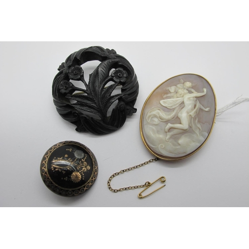 101 - A Large Oval Shell Carved Cameo Brooch, depicting fairy and cherub (5.7cm long), collet set; togethe... 