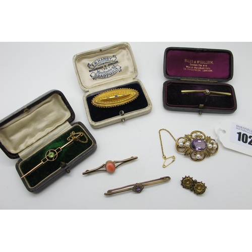 102 - A Collection of XIX Century and Later Brooches, including a 15ct gold locket back brooch, of oval de... 